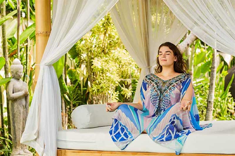 Girl meditating at Bliss Bali retreat