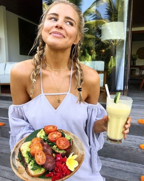 Tegan Martin about to enjoy delicious healthy breakfast at Bliss Bali retreat