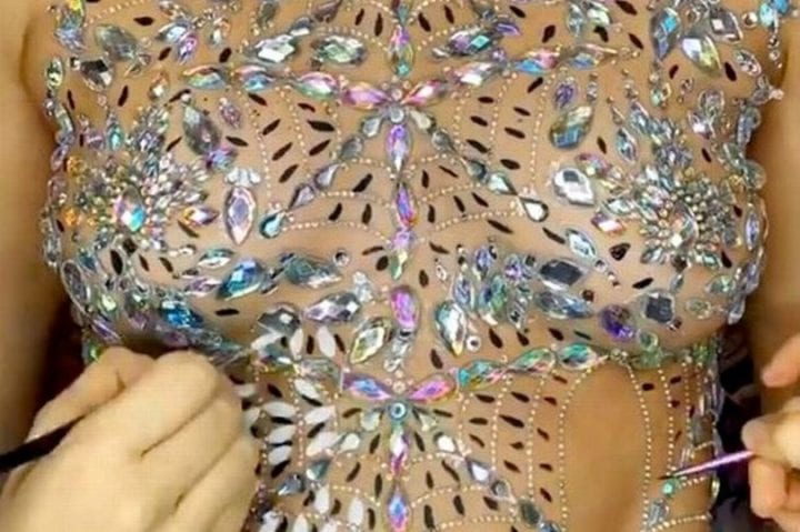 Women apply stick-on gems and glitter to their breasts (Image: Instagram)